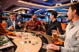 Layar fitur bonus Mahjong Ways menampilkan simbol Scatter dan putaran gratis yang diaktifkan dengan latar belakang mahyong yang bersinar